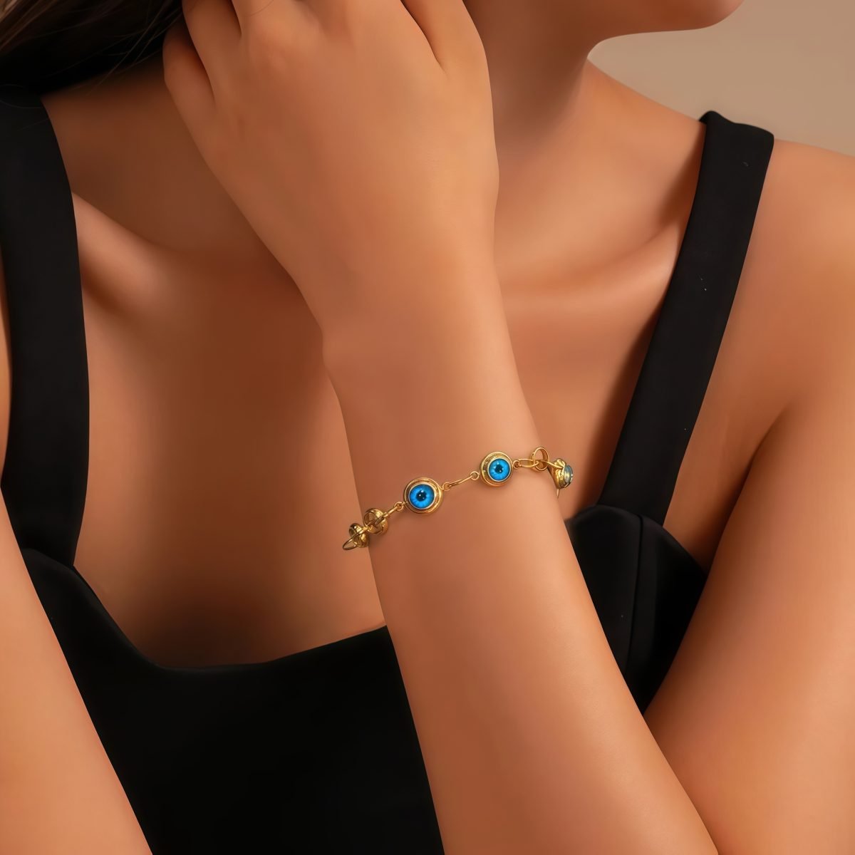 Minimalist evil eye bracelet with cosmic energy protection, worn on wrist