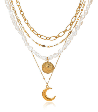 Celestial Harmony Necklace with gold chains and sun, moon, pearl charms