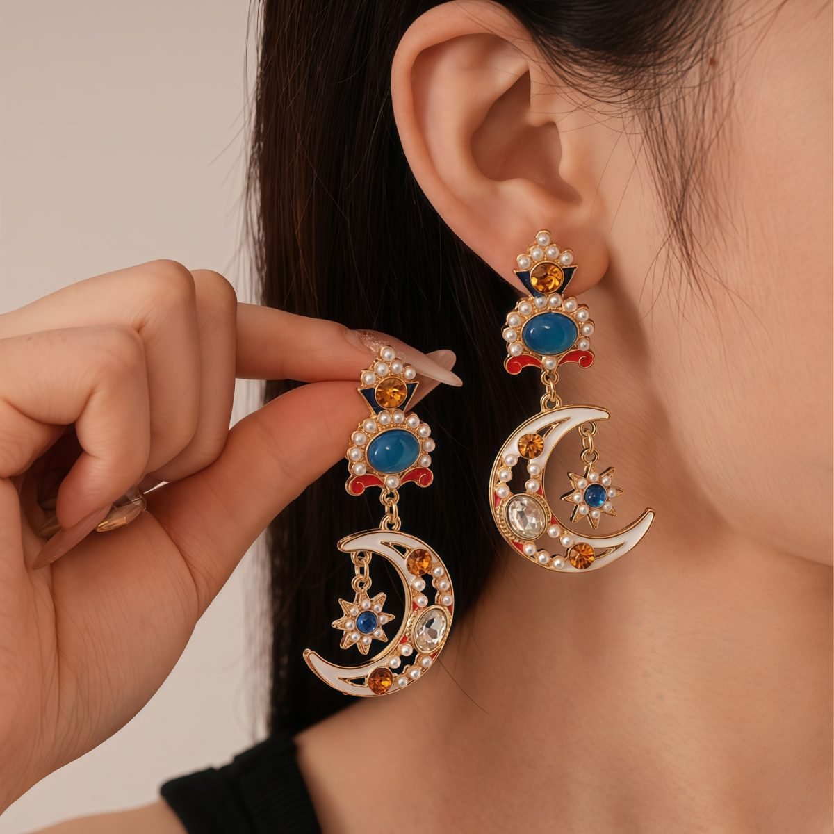 Woman wearing Celestial Pearl Earrings – lunar elegance and grace