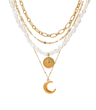 Celestial Harmony Necklace with gold chains and sun, moon, pearl charms