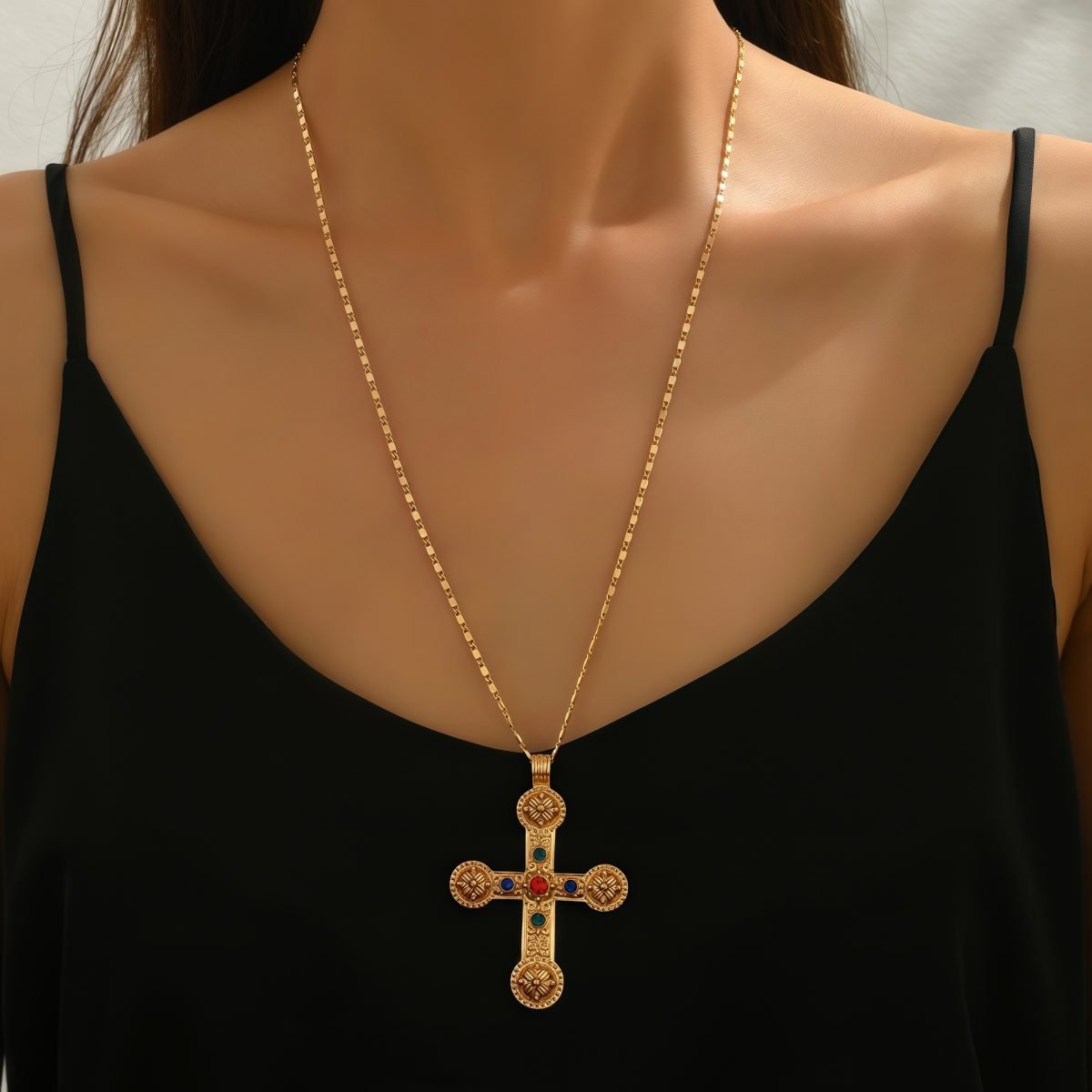 Woman wearing Cosmic Energy Cross Necklace for spiritual elegance and daily style