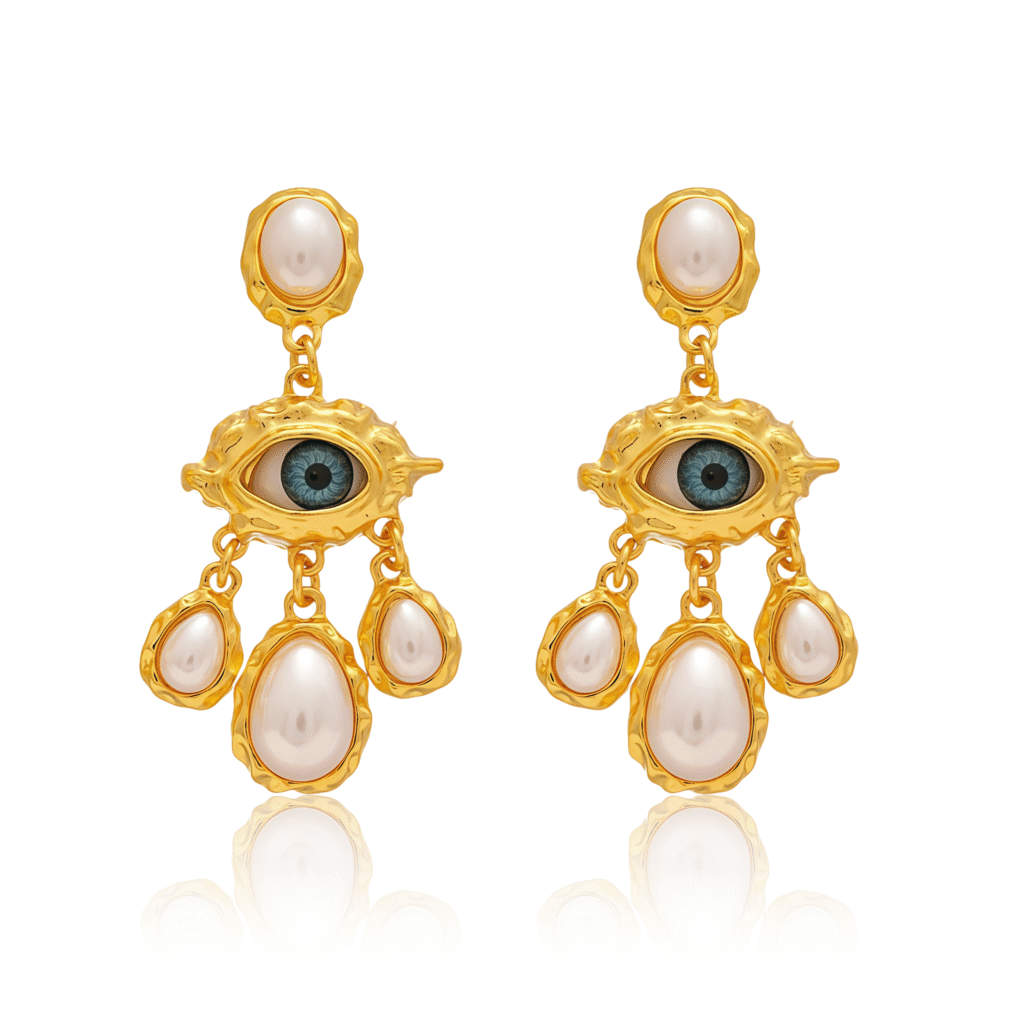 Cosmic Energy Pearl Earrings with Evil Eye and tassels on white background