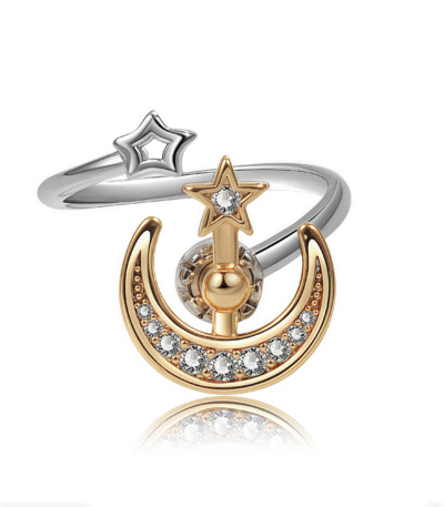 Rotating moon and star ring made of titanium steel plated in 18K gold with cosmic energy design