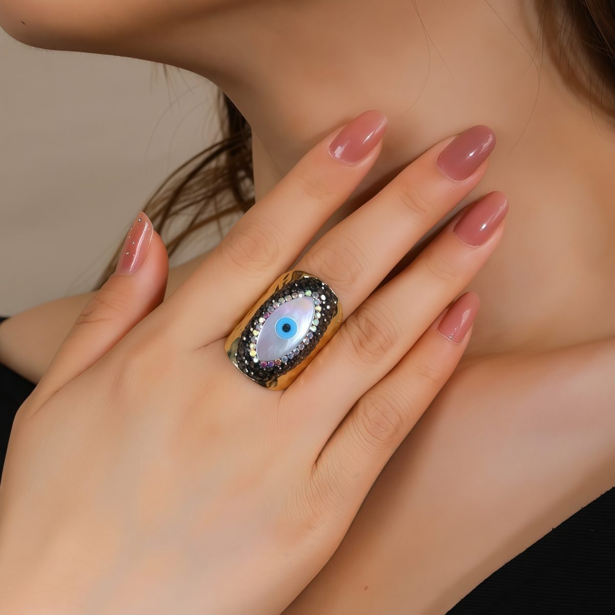 Model wearing Evil Eye Shell Ring – Cosmic Spiral Protection