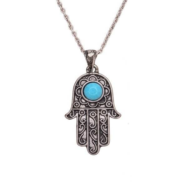Cosmic Energy Hamsa Necklace with turquoise charm on white background