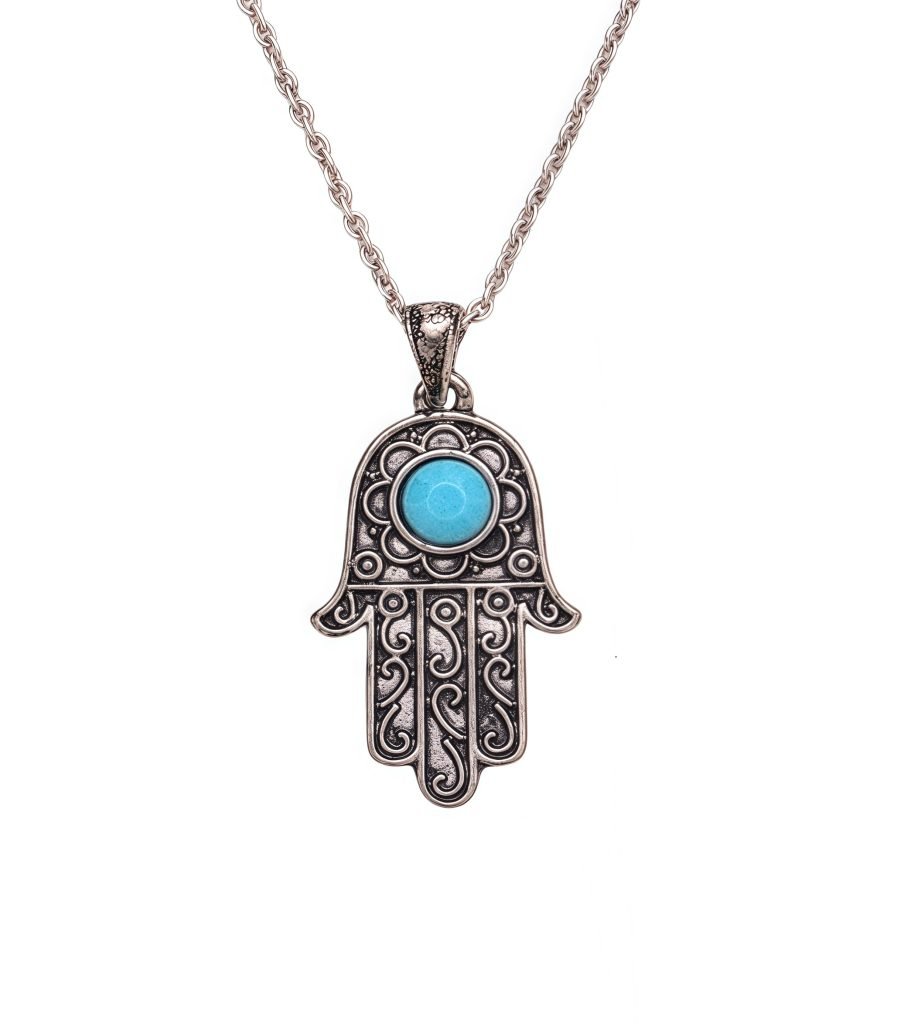 Cosmic Energy Hamsa Necklace with turquoise charm on white background