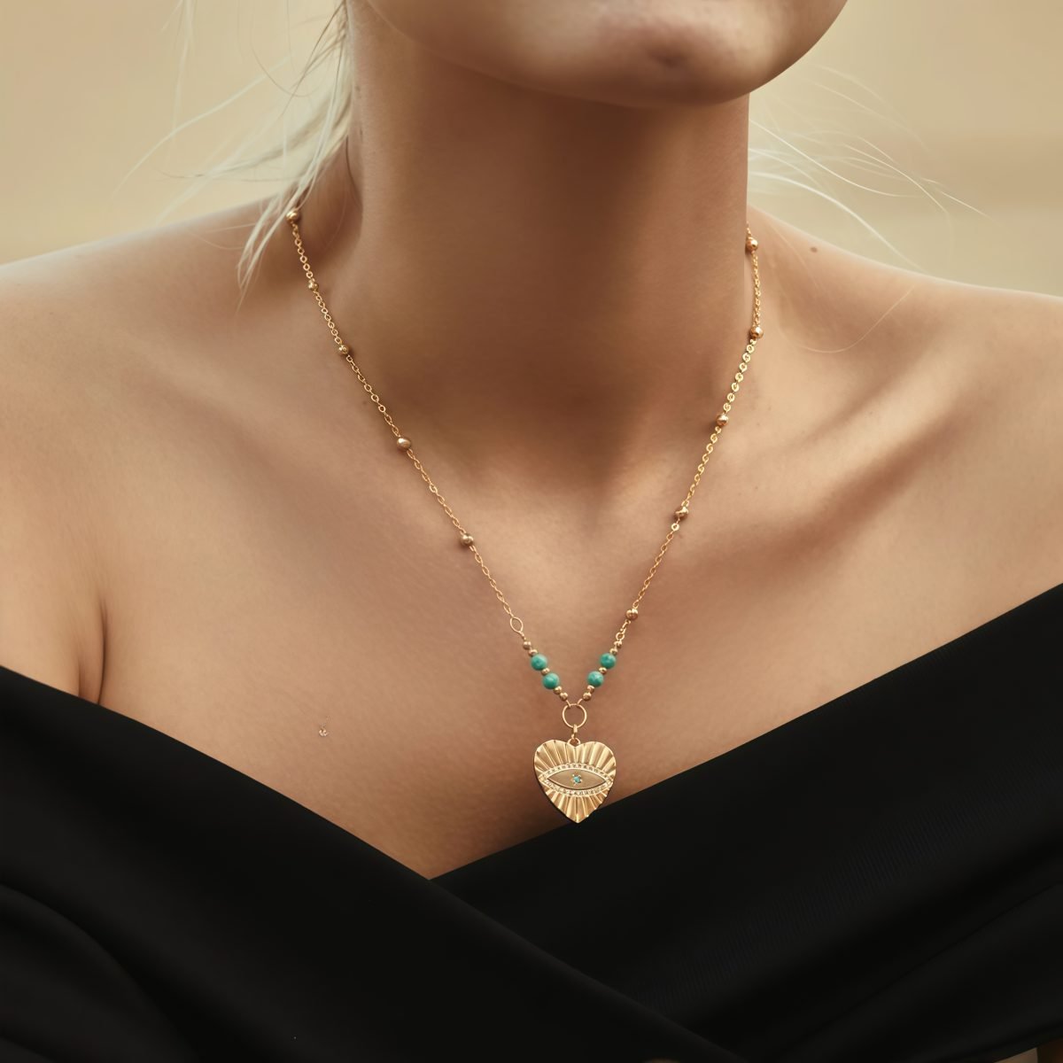 Model wearing Cosmic Love Turquoise Peach Heart Evil Eye Necklace
