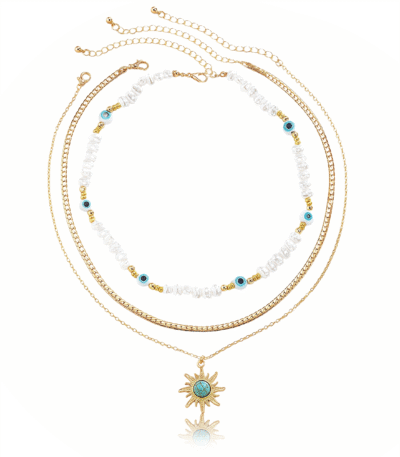 Cosmic Energy pearl and sun trio necklace set on display – layered celestial jewelry