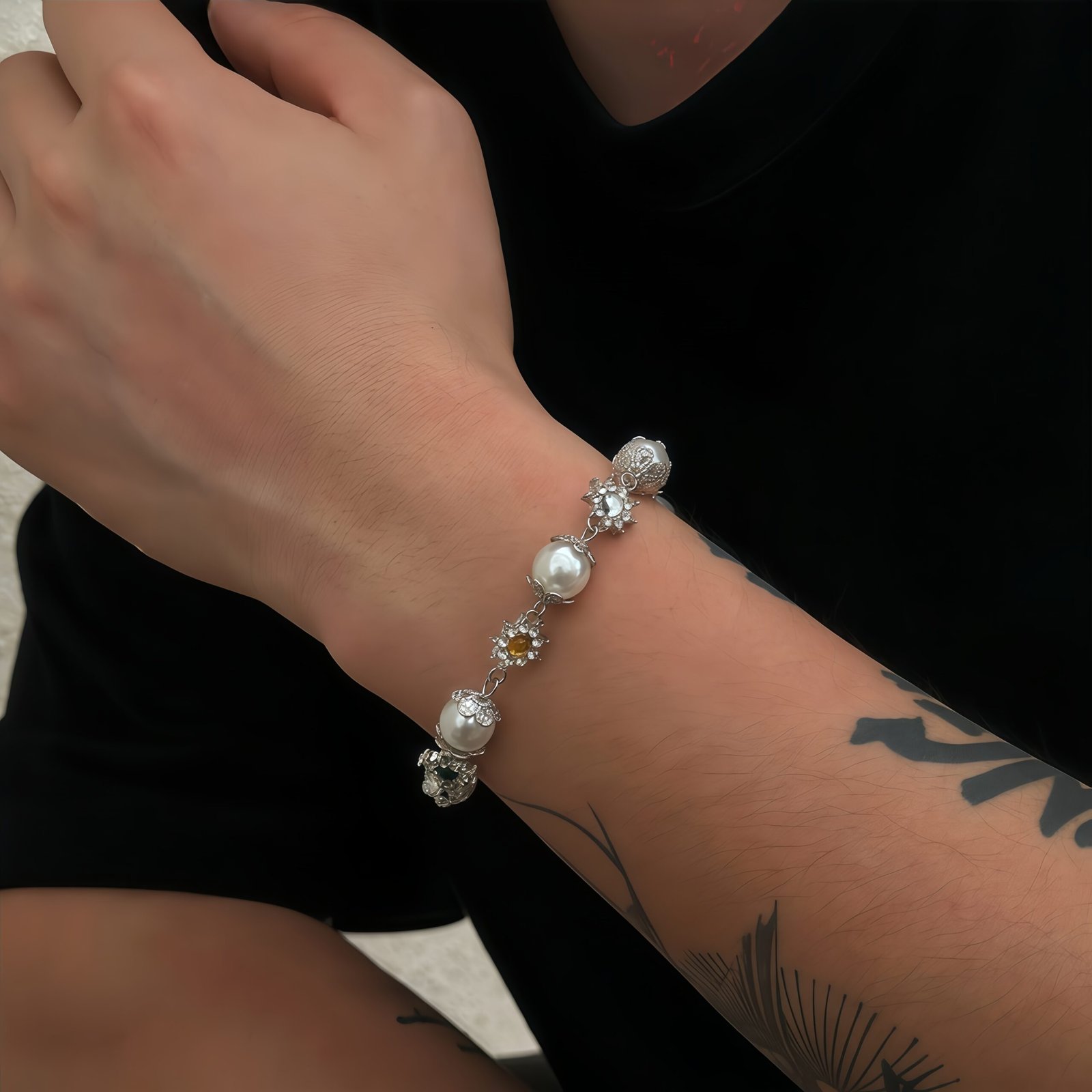 Cosmic Pearl Bracelet – Rainbow Flower Charms-model Model wearing Cosmic Pearl Bracelet – Rainbow Flower Charms