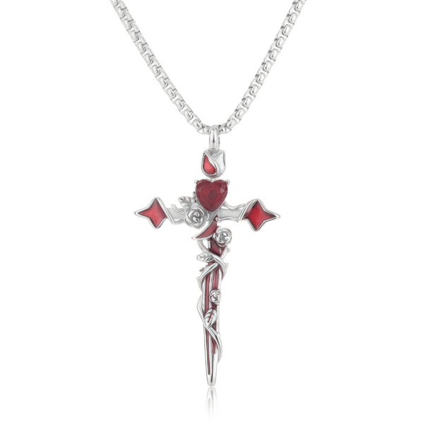 Silver cross pendant with red heart crystal and vine rose details, symbolizing love and protection